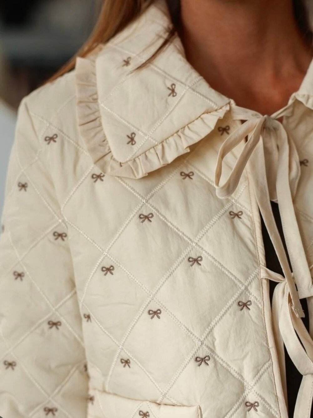 Cream Quilted Tie-Front Jacket with Embroidered Bows